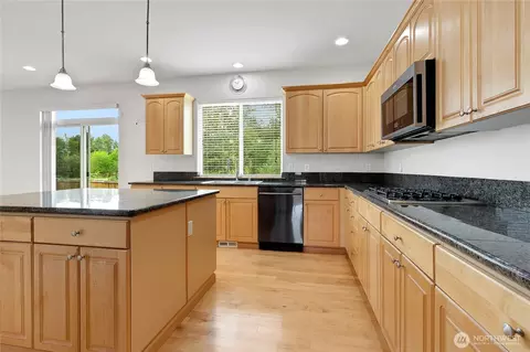 Kitchen - 1522 Daffodil Ave NE, Orting, WA 98360 photo 3 of 3
