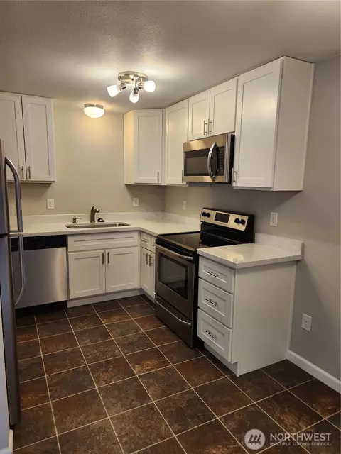 Kitchen - 122 169th St E, Spanaway, WA 98387 photo 4 of 5