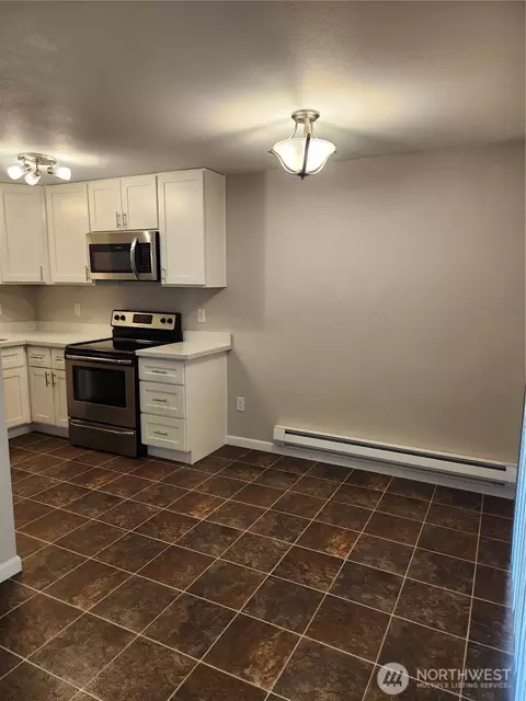 Kitchen - 122 169th St E, Spanaway, WA 98387 photo 3 of 5