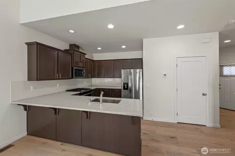 Kitchen - 920 E Old Ranch Rd #E1-E2, Allyn, WA 98524 photo 2 of 2