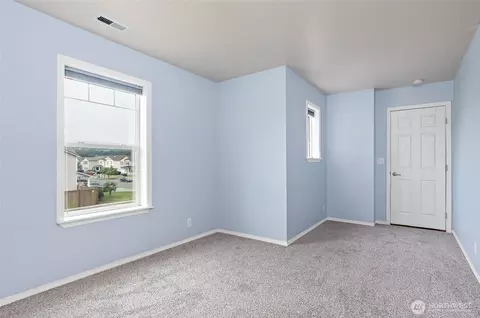 Bedroom - 908 Daffodil Ave NE, Orting, WA 98360 photo 2 of 8