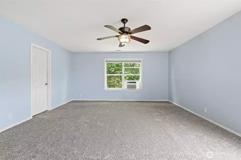 Bedroom - 908 Daffodil Ave NE, Orting, WA 98360 photo 7 of 8