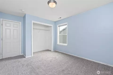 Bedroom - 908 Daffodil Ave NE, Orting, WA 98360 photo 3 of 8