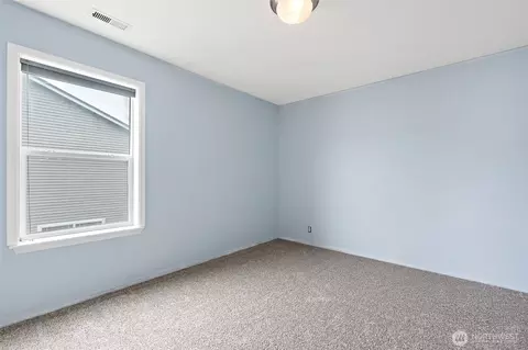 Bedroom - 908 Daffodil Ave NE, Orting, WA 98360 photo 4 of 8