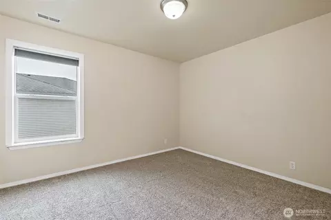 Bedroom - 908 Daffodil Ave NE, Orting, WA 98360 photo 5 of 8