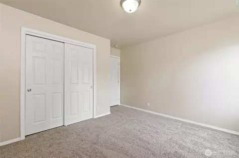 Bedroom - 908 Daffodil Ave NE, Orting, WA 98360 photo 6 of 8
