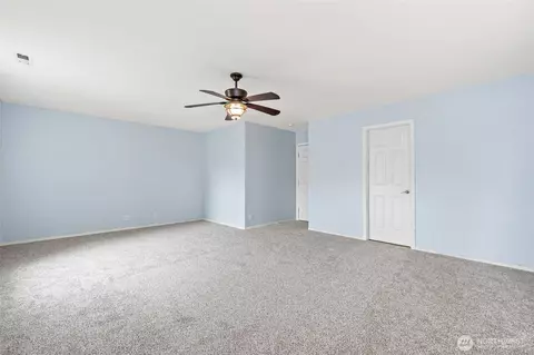 Bedroom - 908 Daffodil Ave NE, Orting, WA 98360 photo 8 of 8