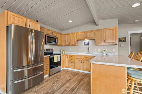 Kitchen - 2351 E Mason Lake Dr E, Grapeview, WA 98546 photo 2 of 3