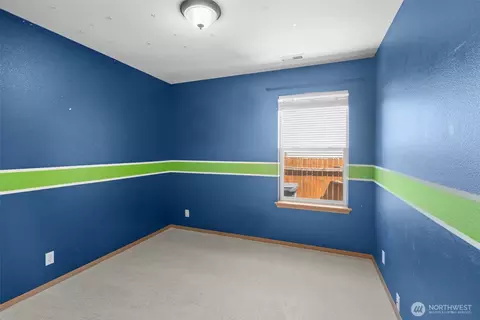 Bedroom - 212 Mazza St NE, Orting, WA 98360 photo 6 of 9