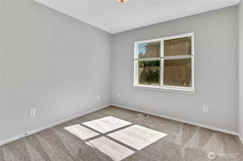 Bedroom - 1401 Riddell Ave NE, Orting, WA 98360 photo 1 of 6