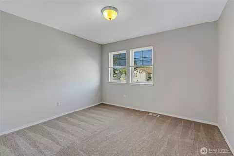 Bedroom - 1401 Riddell Ave NE, Orting, WA 98360 photo 3 of 6