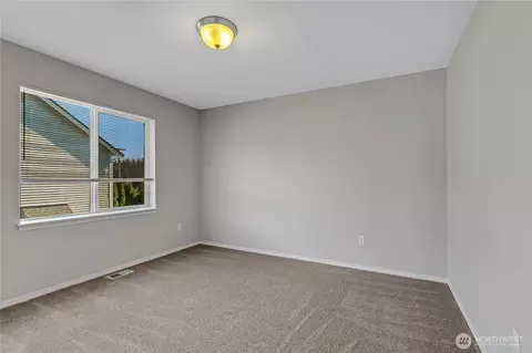 Bedroom - 1401 Riddell Ave NE, Orting, WA 98360 photo 5 of 6