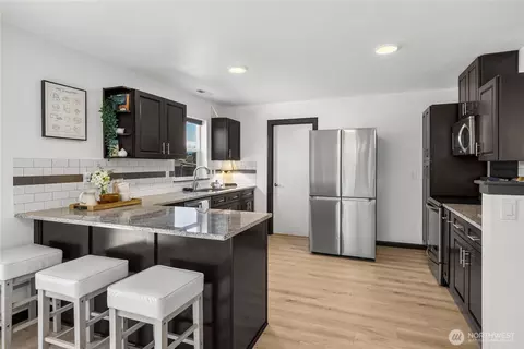 Kitchen - 903 Williams St NW, Orting, WA 98360 photo 3 of 6