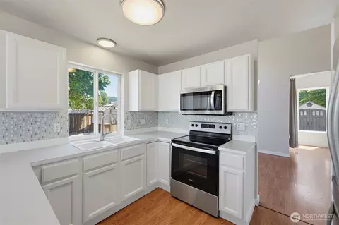 Kitchen - 402 Orting Ave NW, Orting, WA 98360 photo 3 of 4