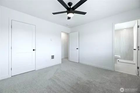 Bedroom - 317 Icey St SW, Orting, WA 98360 photo 2 of 5