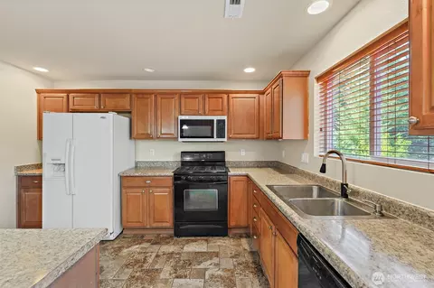 Kitchen - 1413 177th St E, Spanaway, WA 98387 photo 4 of 4