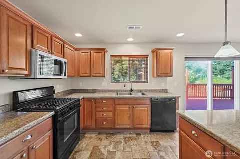 Kitchen - 1413 177th St E, Spanaway, WA 98387 photo 3 of 4