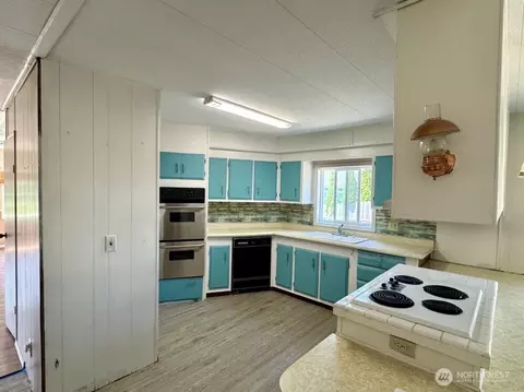 Kitchen - 260 E Olympic Dr, Grapeview, WA 98546 photo 1 of 2