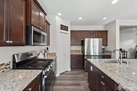 Kitchen - 722 Williams St NW, Orting, WA 98360 photo 4 of 5