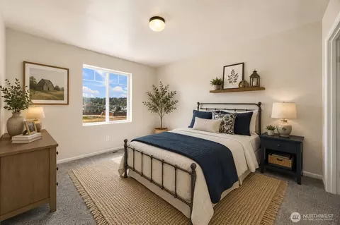 Bedroom - 1404 Daffodil Ave NE, Orting, WA 98360 photo 2 of 4