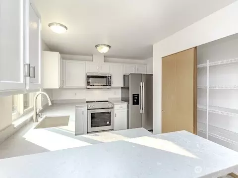 Kitchen - 413 Kensington Ave NW, Orting, WA 98360 photo 1 of 2