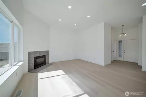 Living - 304 Eldredge Ct NW, Orting, WA 98360 photo 1 of 3