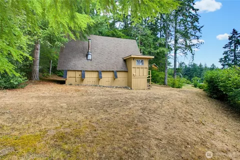 Exterior - 640 E Rauschert Rd, Grapeview, WA 98546 photo 8 of 11