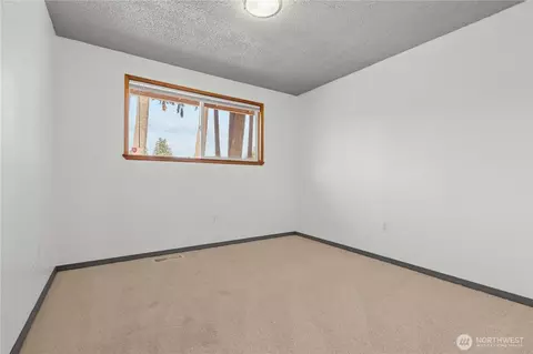 Bedroom - 1211 196th St E, Spanaway, WA 98387 photo 2 of 3