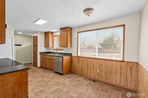 Kitchen - 1211 196th St E, Spanaway, WA 98387 photo 3 of 4