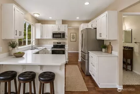 Kitchen - 19307 73rd Ave E, Spanaway, WA 98387 photo 3 of 4