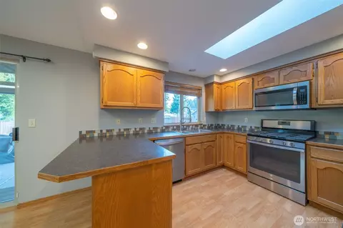 Kitchen - 704 105th Pl SE, Everett, WA 98208 photo 2 of 2