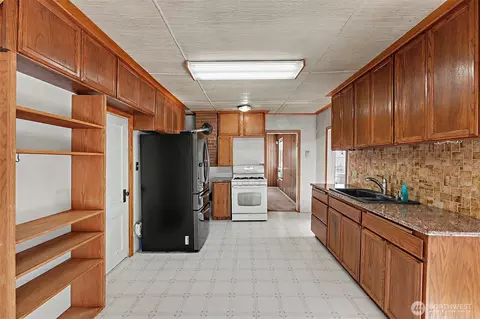 Kitchen - 312 Taylor St SW, Orting, WA 98360 photo 3 of 3