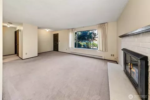 Living - 1145 N 93rd St, Seattle, WA 98103 photo 4 of 6