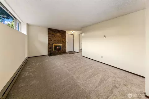Living - 1145 N 93rd St, Seattle, WA 98103 photo 1 of 6