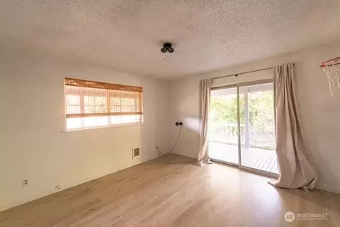 Bedroom - 704 Kansas St SW, Orting, WA 98360 photo 3 of 4