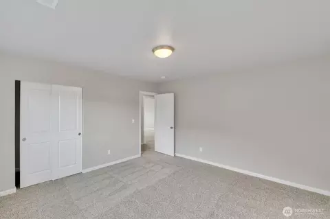 Bedroom - 410 Buell St SW, Orting, WA 98360 photo 1 of 15
