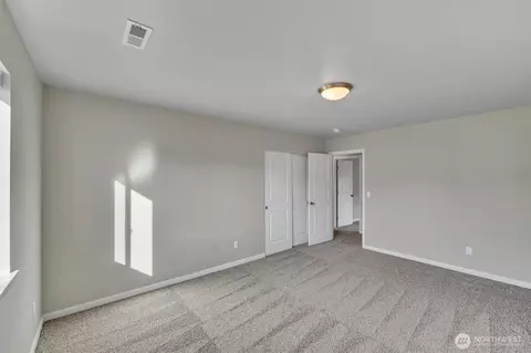 Bedroom - 410 Buell St SW, Orting, WA 98360 photo 8 of 15