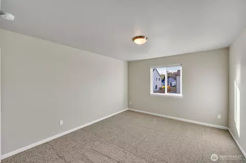 Bedroom - 410 Buell St SW, Orting, WA 98360 photo 12 of 15