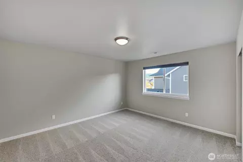 Bedroom - 410 Buell St SW, Orting, WA 98360 photo 7 of 15