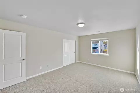 Bedroom - 410 Buell St SW, Orting, WA 98360 photo 11 of 15