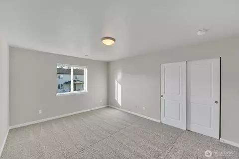 Bedroom - 410 Buell St SW, Orting, WA 98360 photo 2 of 15