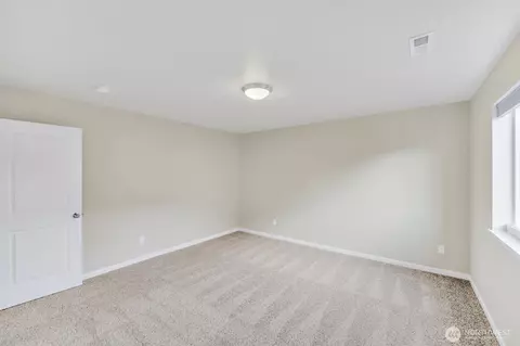 Bedroom - 410 Buell St SW, Orting, WA 98360 photo 5 of 15