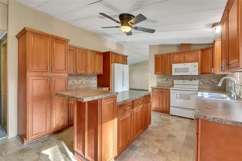 Kitchen - 836 Harman Way S #56, Orting, WA 98360 photo 3 of 4