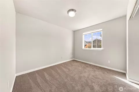 Bedroom - 213 Phoenix Ave SW, Orting, WA 98360 photo 2 of 5