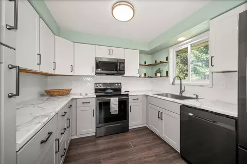 Kitchen - 711 E Cascade Pl, Spokane, WA 99208 photo 1 of 2