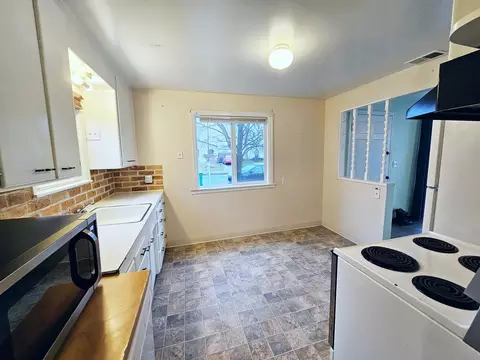 Kitchen - 1024 E Queen Ave, Spokane, WA 99207 photo 3 of 3