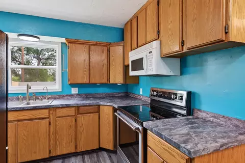 Kitchen - 928 E Olympic Ave, Spokane, WA 99207 photo 1 of 3