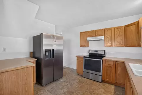 Kitchen - 1105 E Olympic Ave, Spokane, WA 99207 photo 1 of 3