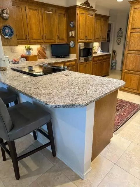 Kitchen - 203 N Navasota Dr, Plainview, TX 79072 photo 6 of 7