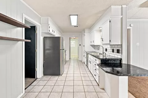 Kitchen - 1003 Cedar Ave, Idalou, TX 79329 photo 2 of 4